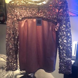 Brand new mauve blouse.